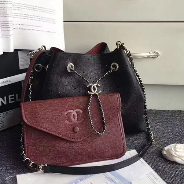 Ch**el perforated drawstring bucket bag black