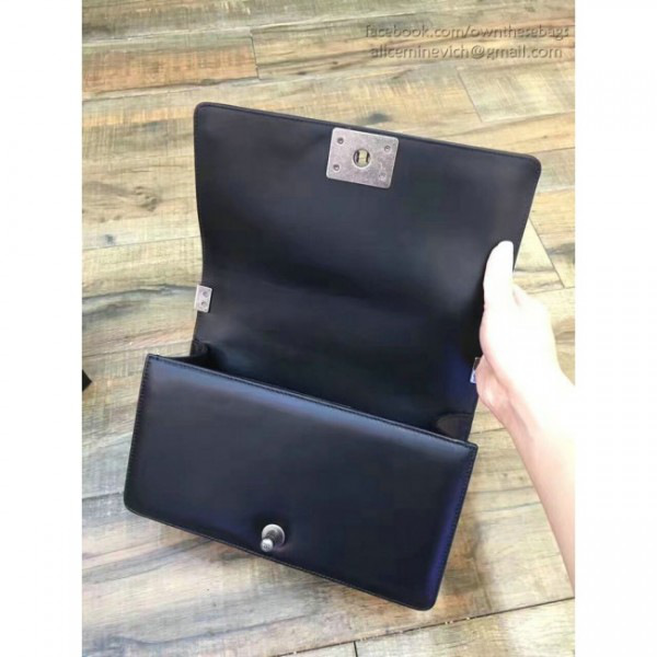 Ch**el braided calfskin boy bag black