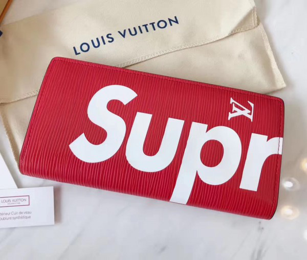 l0vis Vvtt0n svp*me wallet red 3179