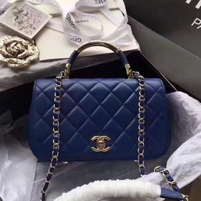 Ch**el caviar quilted lambskin flap bag with top handle blue