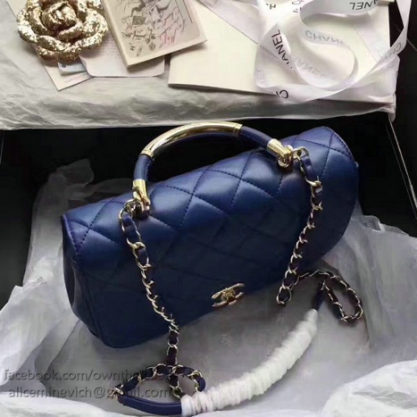 Ch**el caviar quilted lambskin flap bag with top handle blue
