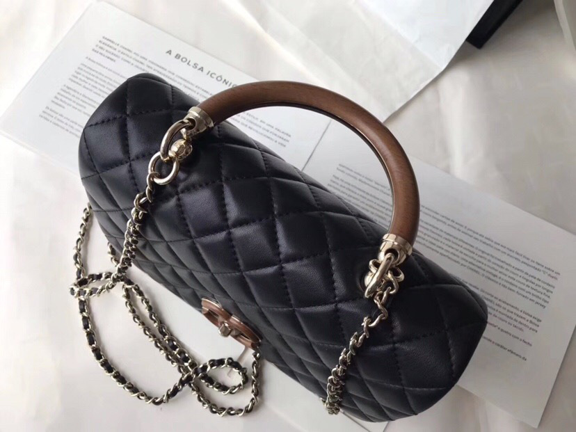 Ch**el flap bag with top handle black 21cm