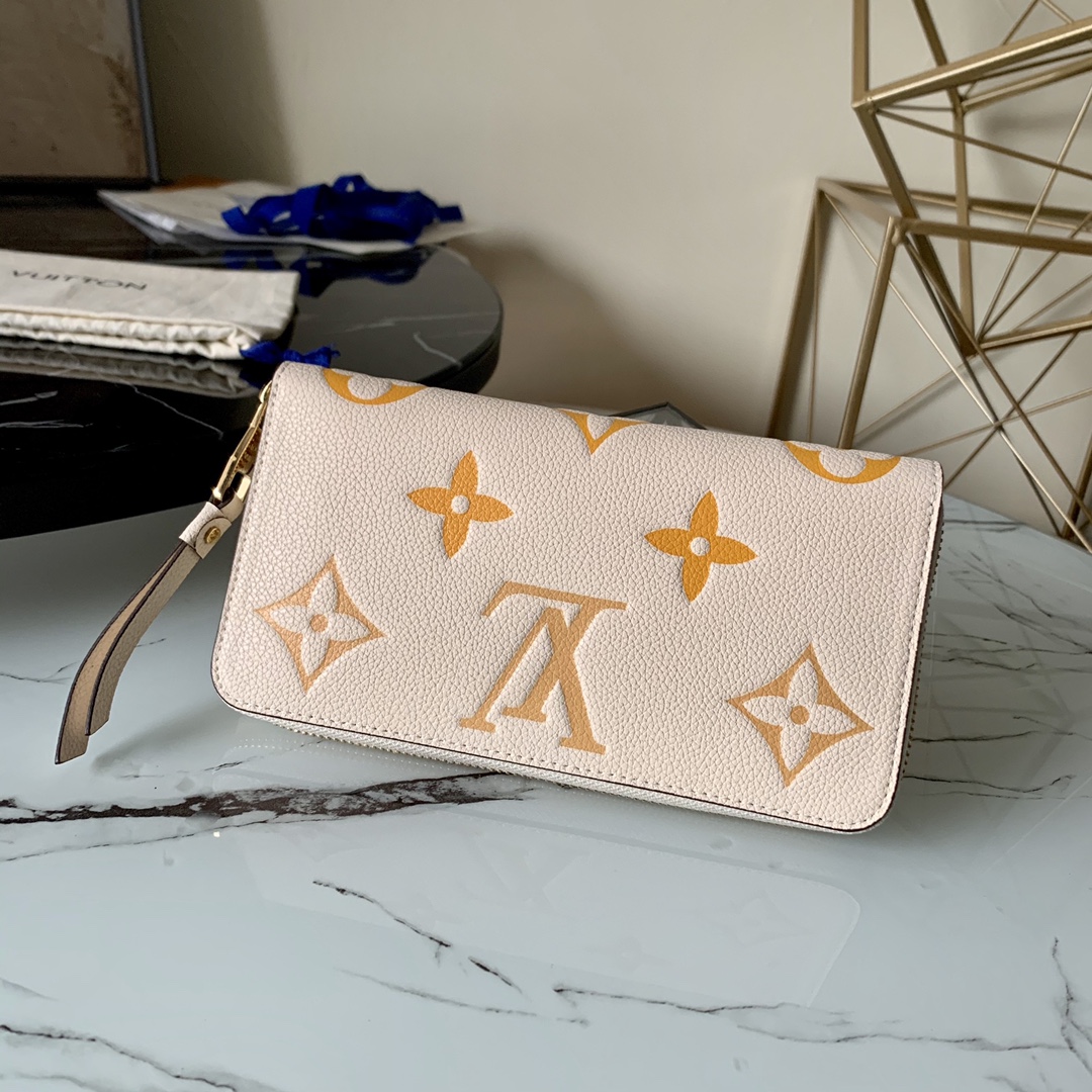 l0vis Vvtt0n by the pool zippy wallet monogram empreinte in cream m80402 19.5 x 10.5 x 2.5 cm