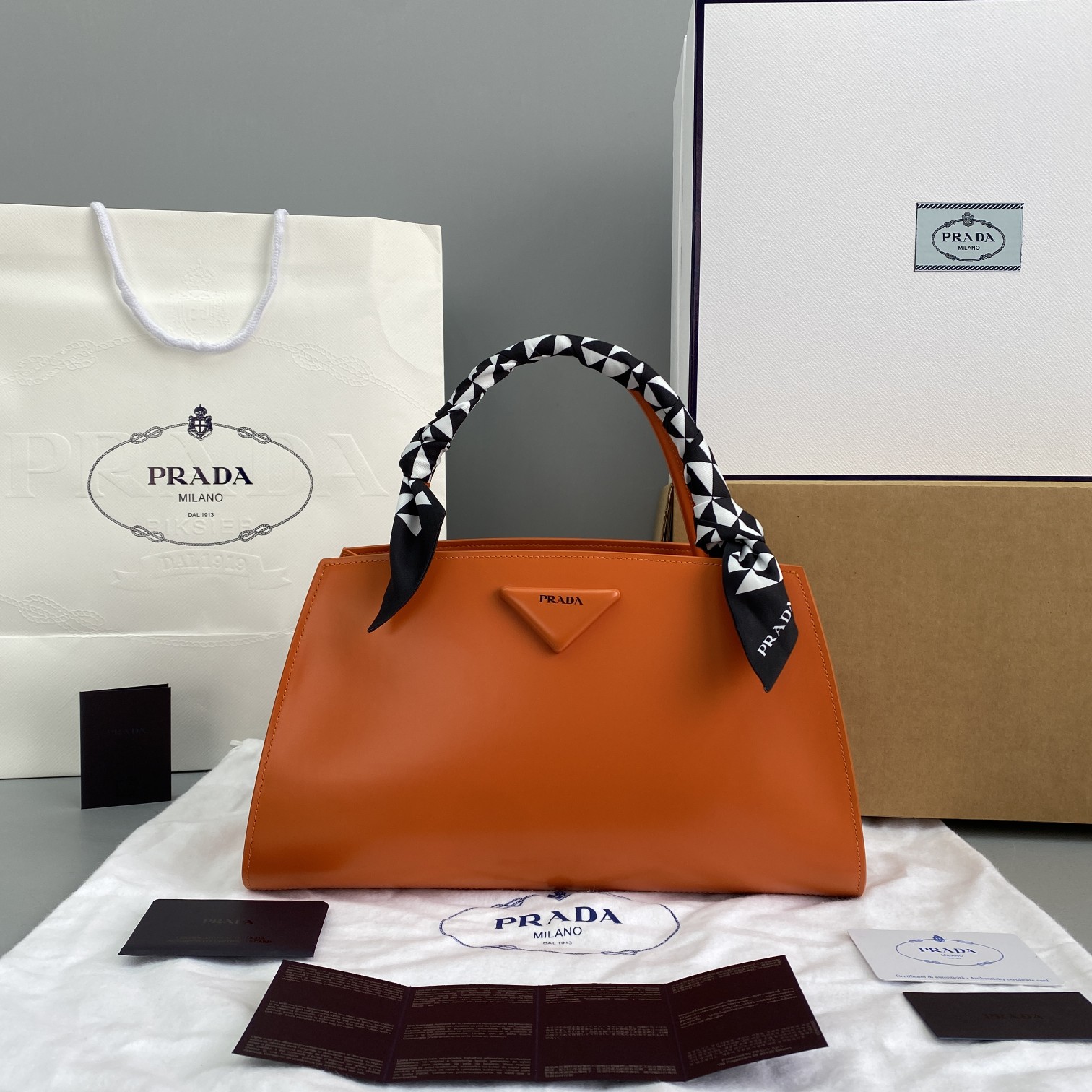 pra*a M1vccia x raf simons orange 33 x 18 x 13.5 cm