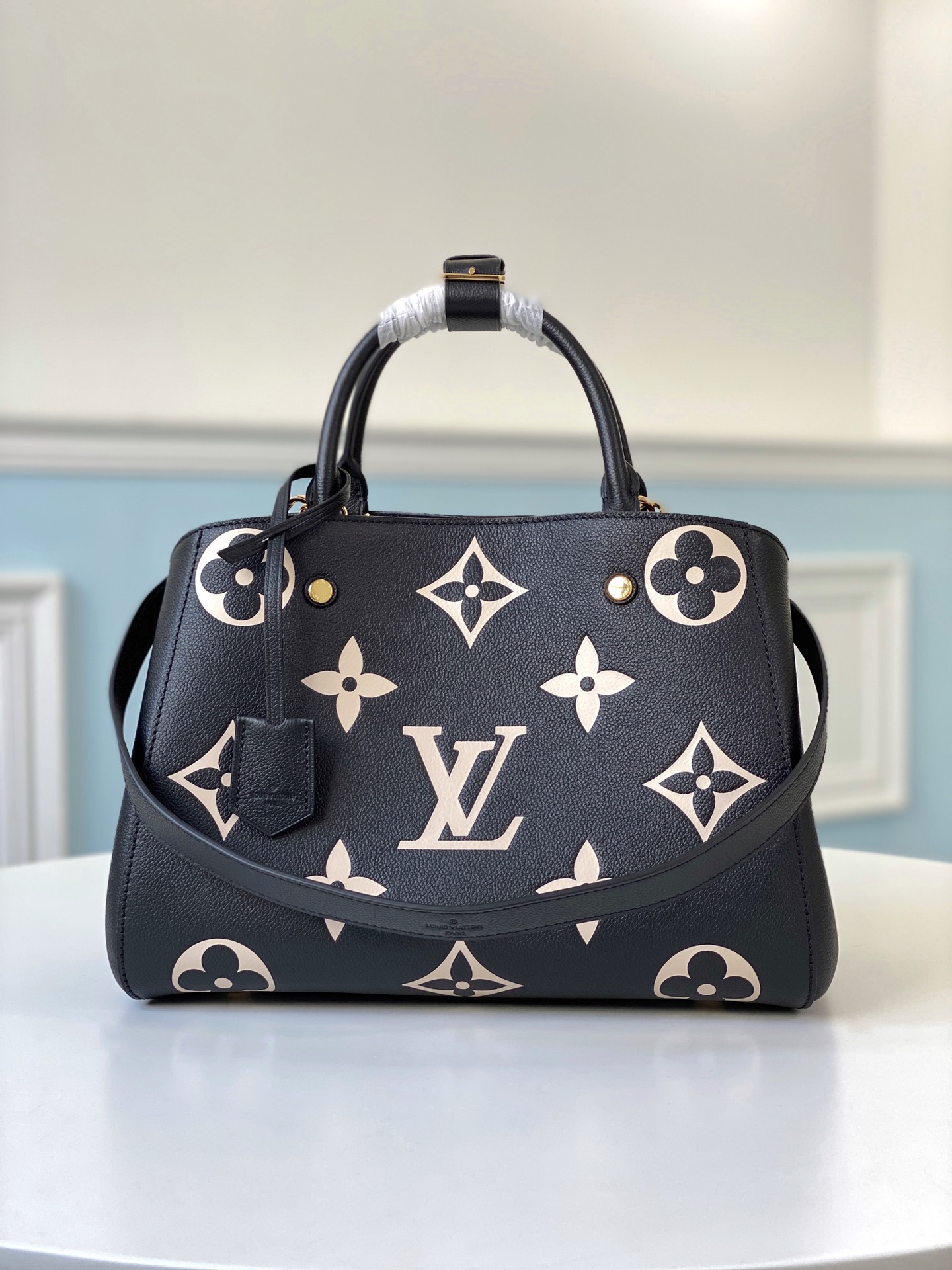 l0vis Vvtt0n montaigne mm bicolor monogram empreinte leather m45499 33 x 23 x 15 cm