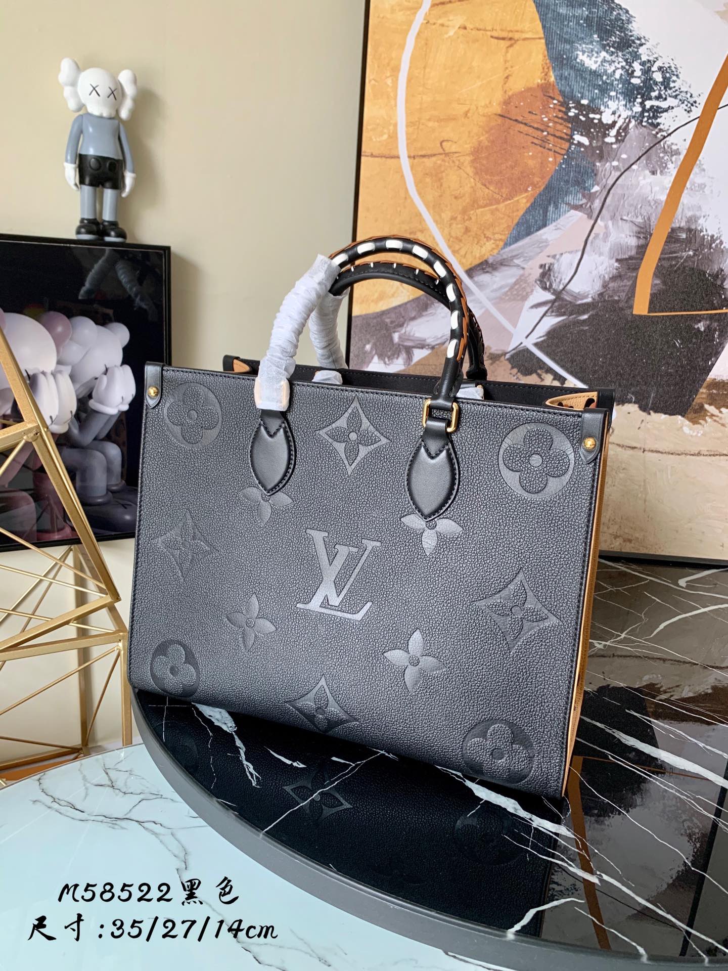 l0vis Vvtt0n onthego mm monogram empreinte embossed leather noir m58522 35 cm