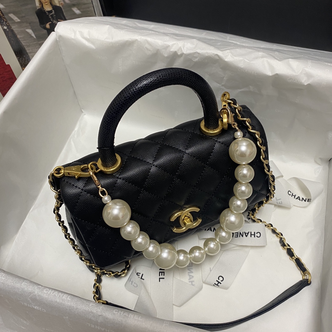 Ch**el flap bag with black top handle grained calfskin gold metal black a92990 23 cm