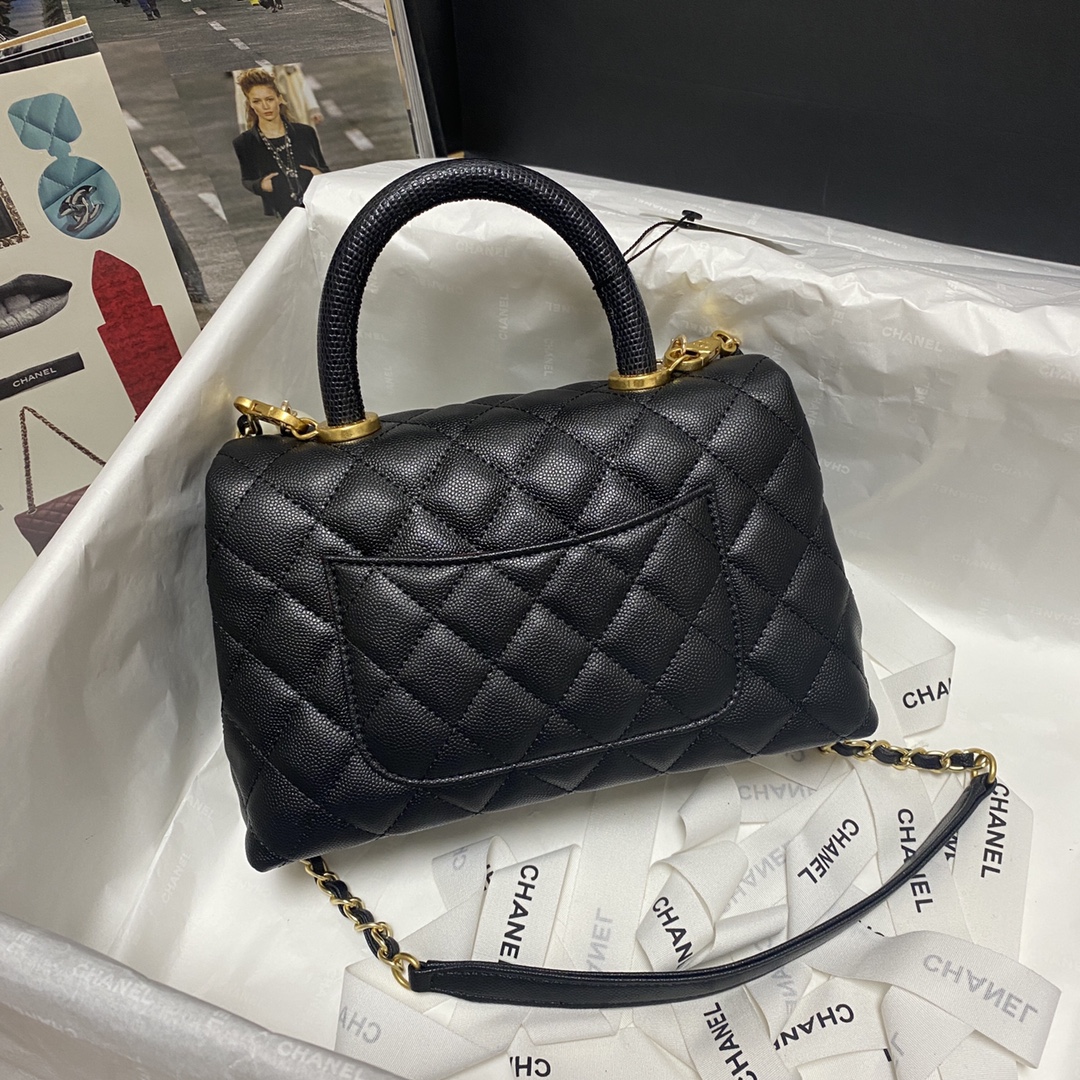 Ch**el flap bag with black top handle grained calfskin gold metal black a92990 23 cm