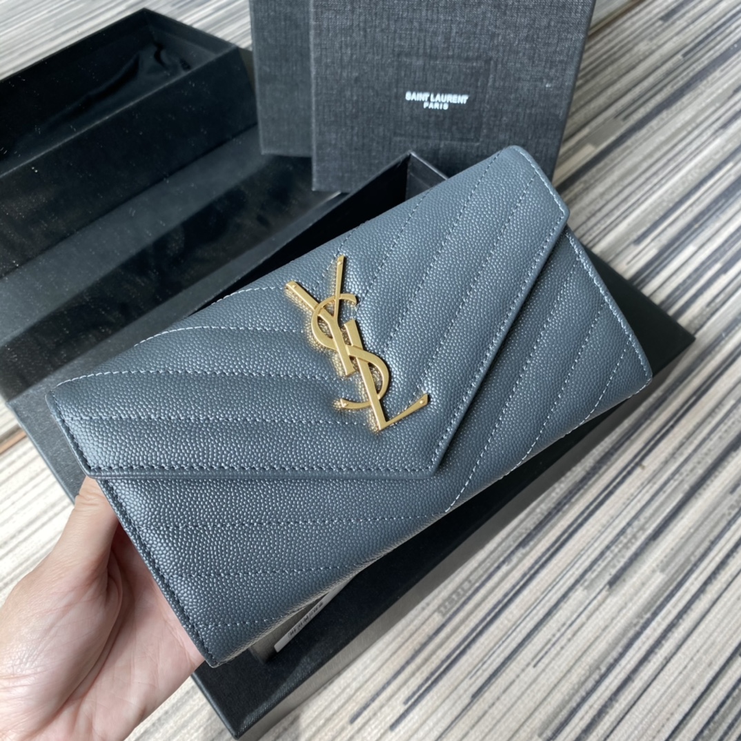 Y51 large monogram flap wallet in grain de poudre embossed leather blue 372264 19 x 11 cm
