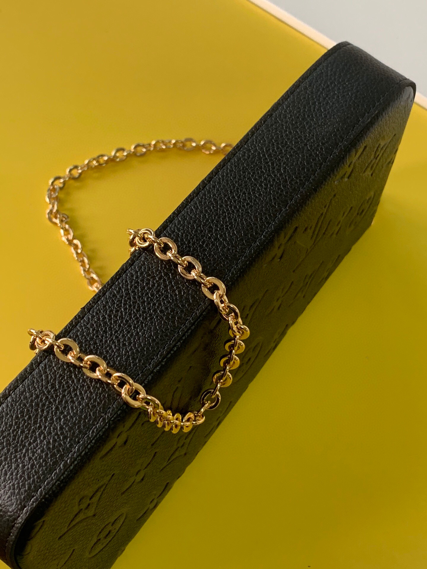 l0vis Vvtt0n fÉlicie pochette monogram empreinte leather black m64064 21 x 12 x 3 cm