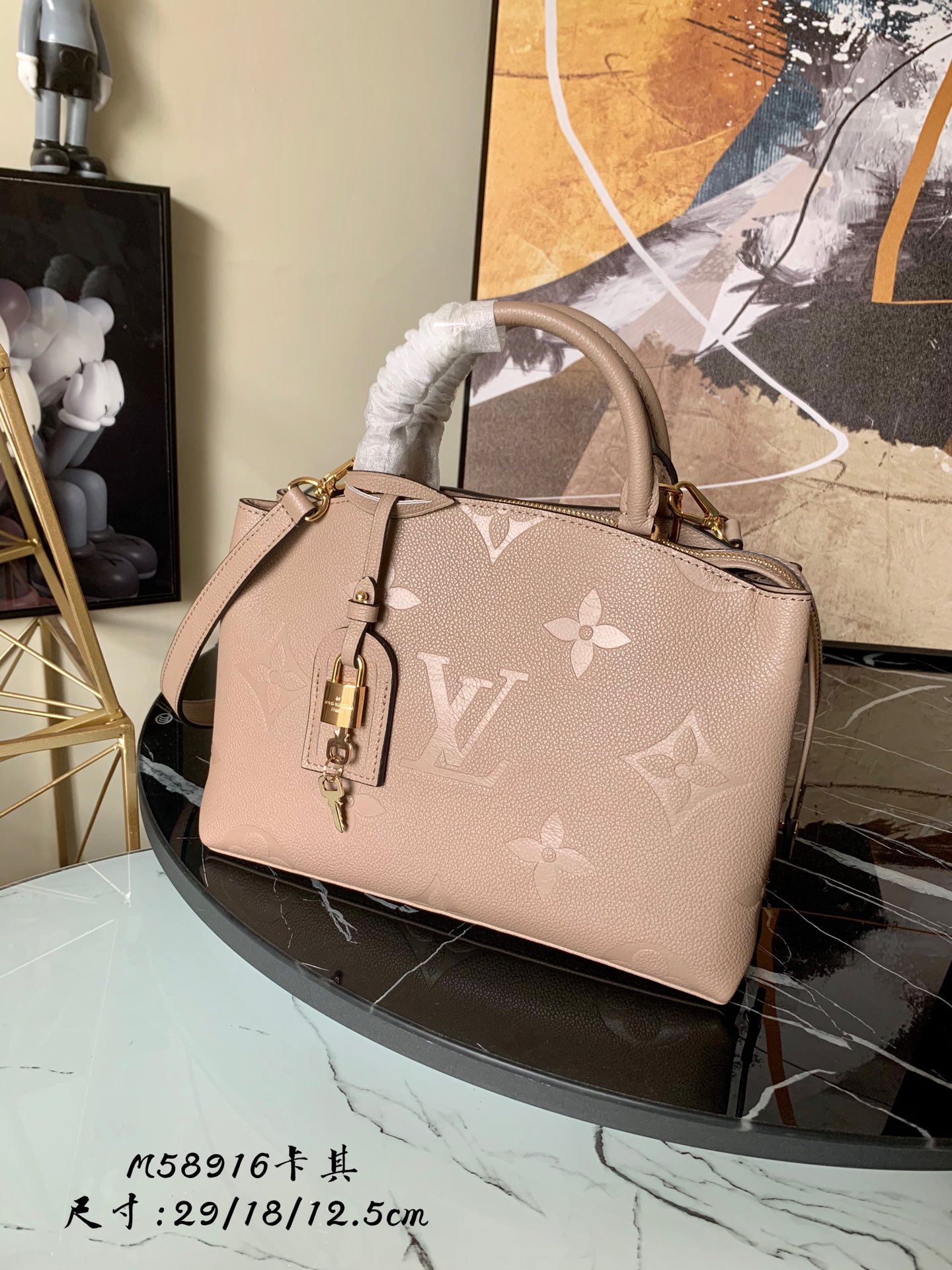 l0vis Vvtt0n petit palais monogram empreinte leather beige m58916 29 x 18 x 12.5 cm
