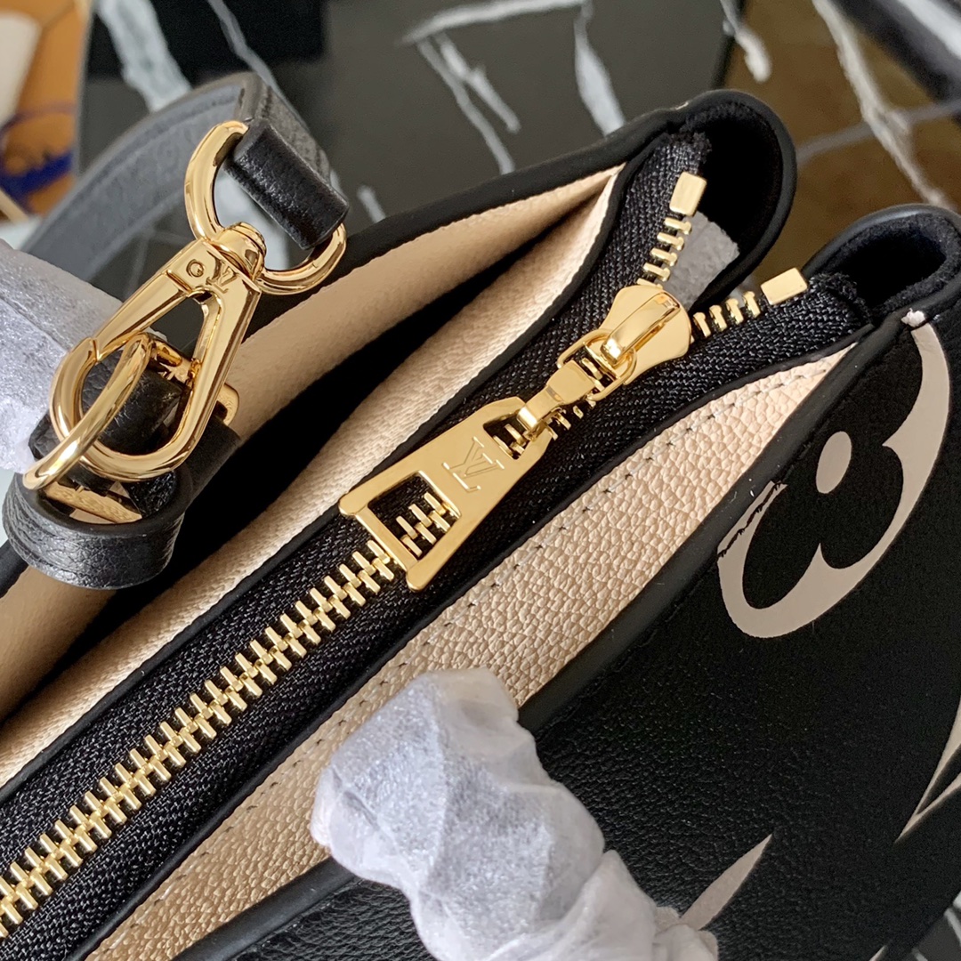 l0vis Vvtt0n grand palais biocolor monogram empreinte pattern black and beige m45842 34 x 24 x 15 cm