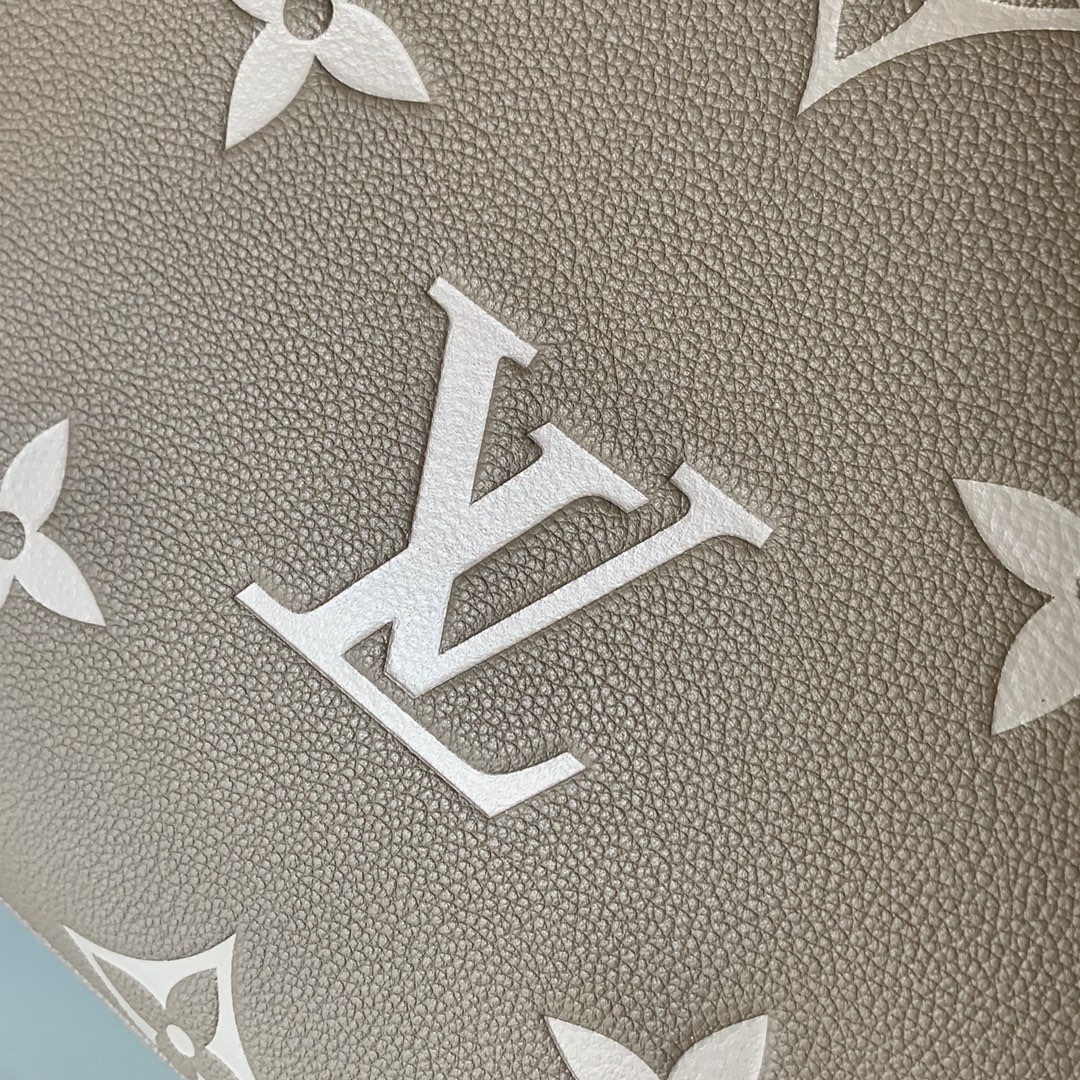 l0vis Vvtt0n grand palais biocolor monogram empreinte pattern beige and creme m45842 34 x 24 x 15 cm