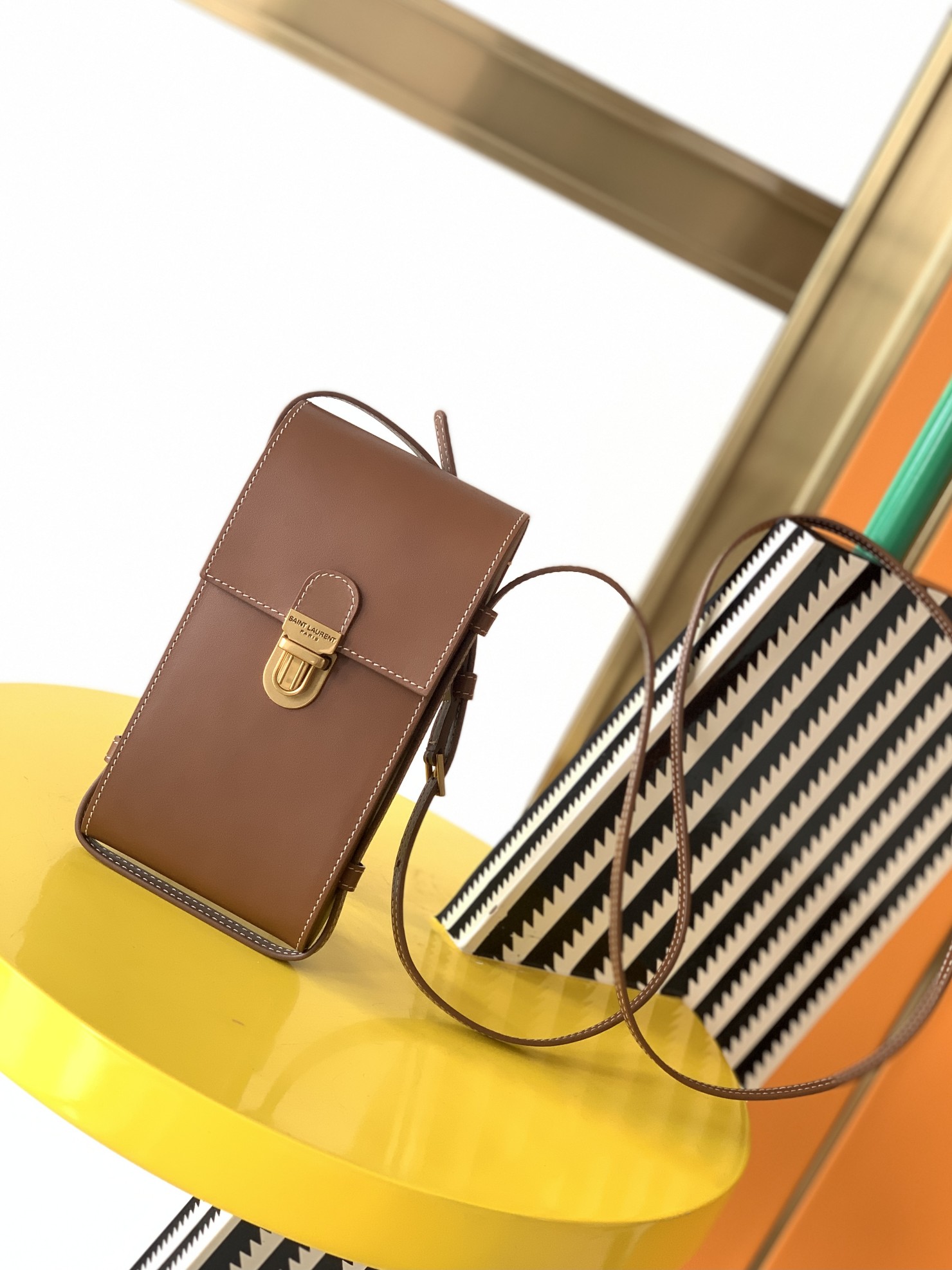 y51 tuc phone pouch with strap in S*pple calfskin brown 6677182 9 x 3.5 x 18 cm