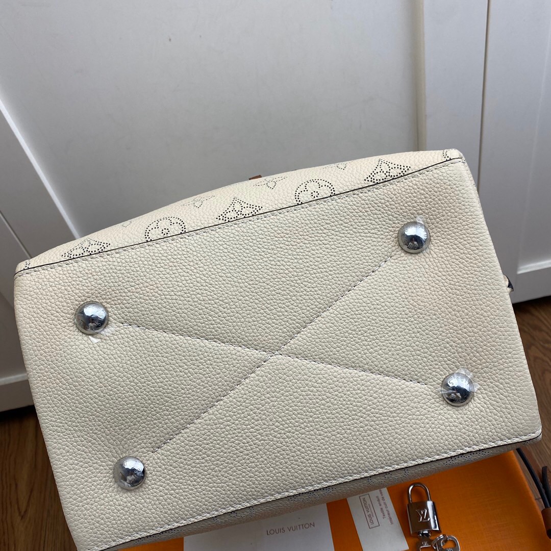 l0vis Vvtt0n muria mahina monogram motif creme m55801 25 x 25 x 20 cm